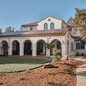 Back of house with view of loggia