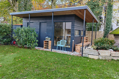 ミュンヘンにあるミッドセンチュリースタイルのおしゃれな物置小屋・庭小屋の写真