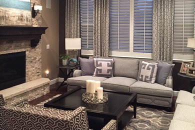 Mid-sized transitional open concept dark wood floor living room photo in Denver with beige walls, a standard fireplace, a stone fireplace and a media wall
