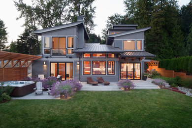 Mid-sized contemporary gray split-level concrete fiberboard exterior home idea in Seattle