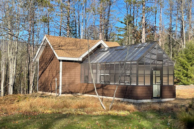 Mid-sized detached studio / workshop shed photo in New York