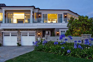 Inspiration for a coastal exterior home remodel in Orange County