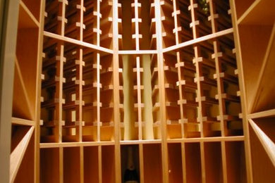 Inspiration for a timeless wine cellar remodel in New York
