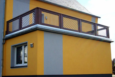 Large contemporary balcony in Other.