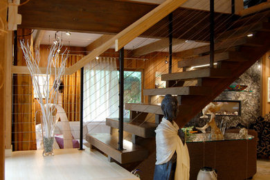 Inspiration for a contemporary staircase remodel in Other