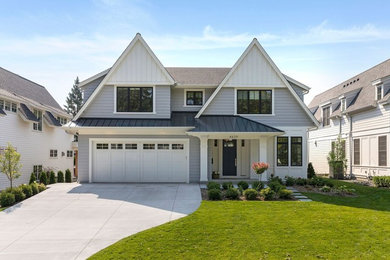 Mid-sized transitional green house exterior idea in Minneapolis