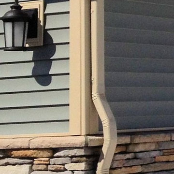 Gutter Installation - Rock/blueish green