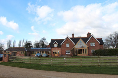 Inspiration for an expansive traditional home design in West Midlands.