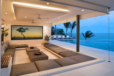 Inspiration for a contemporary home theater remodel in Miami