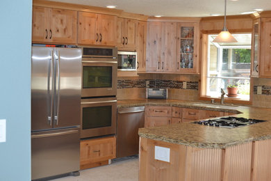 Mid-sized mountain style u-shaped porcelain tile open concept kitchen photo in Vancouver with a double-bowl sink, recessed-panel cabinets, medium tone wood cabinets, granite countertops, beige backsplash, ceramic backsplash, stainless steel appliances and a peninsula