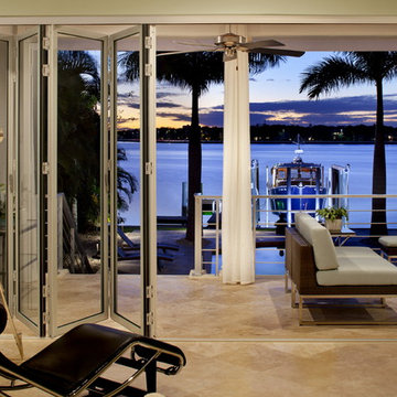 Tampa Remodel Opening directly to sweeping water views through NanaWall doors