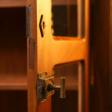 Trim Repair and Full Restoration: Documented 1894 Bookcase on Table