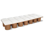 Meridian Furniture - Pavilion Black Boucle Fabric Bench, Cream, Walnut Brown Finish, 108.5" W X 36" D X 17.5" H - Bring valuable seating and remarkable style to your space with this cream Pavilion boucle fabric bench, an exquisite balance of style and usability for the entryway, bedroom, and beyond. Crafted from oak veneer with a walnut brown finish, this bench has a 4-inch-thick seat cushion that's channel-tufted for a touch of luxury. The bench's columnar bases add a dash of art deco design, making it a captivating focal point in any room.
