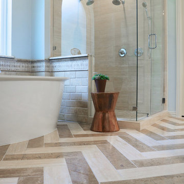 Herrinngbone floor with contrasting vein cut travertine