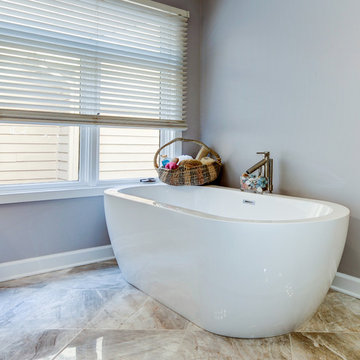 Elegant Master Bathroom Remodel with Quartz-Granite Hybrid Vanity and Spa Shower