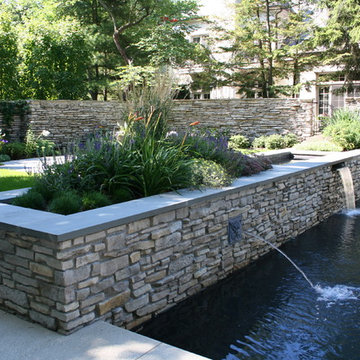 Pool and Reflecting Pond with Natural Stone Elements