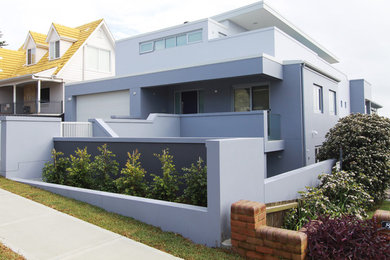 Photo of a modern home design in Sydney.