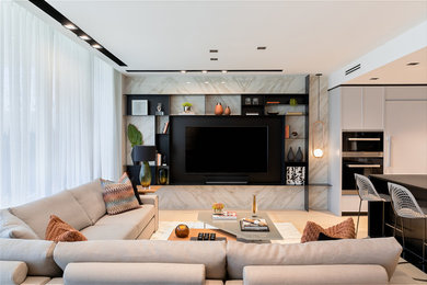 Living room - mid-sized contemporary open concept light wood floor living room idea in Miami with multicolored walls, no fireplace and a media wall