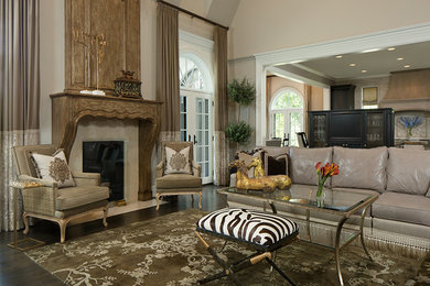 Large traditional formal open concept living room in Chicago with beige walls, dark hardwood floors, a standard fireplace and a wood fireplace surround.