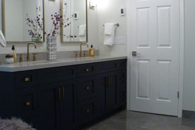 Bathroom - large contemporary master ceramic tile, gray floor and double-sink bathroom idea in Vancouver with shaker cabinets, blue cabinets, a one-piece toilet, white walls, an undermount sink, quartz countertops, gray countertops and a built-in vanity