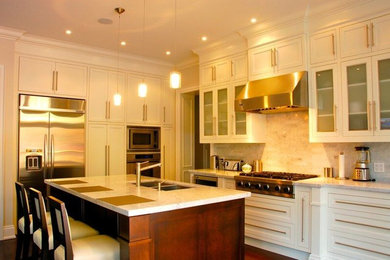Inspiration for a mid-sized timeless l-shaped dark wood floor open concept kitchen remodel in Toronto with a double-bowl sink, shaker cabinets, white cabinets, marble countertops, gray backsplash, stone tile backsplash, stainless steel appliances and an island
