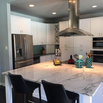 Transitional Kitchen With Statement Island