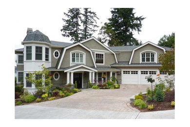 Large elegant gray three-story wood exterior home photo in Seattle