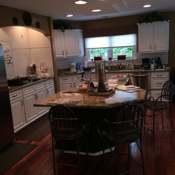 cabinet refacing--2 toned white with chocolate island and bar area