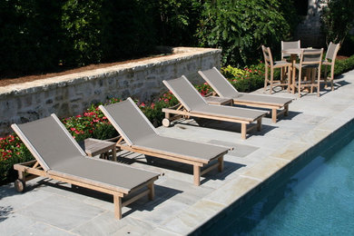 Mid-sized transitional backyard pool in Atlanta with a hot tub and natural stone pavers.