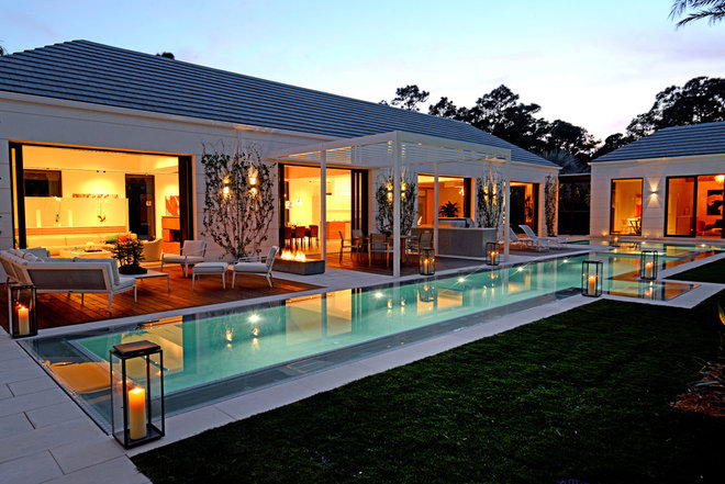 Contemporary Pool by Couture-Homes