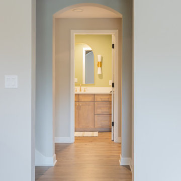Lenexa, Kansas Basement Remodel with Speakeasy-Inspired Entertaining Bar
