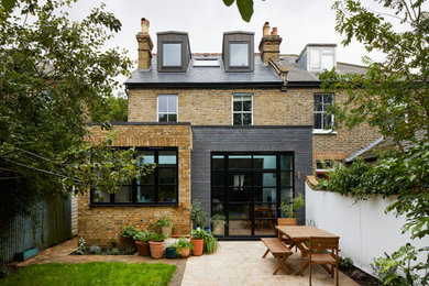 This is an example of a medium sized classic house exterior in London.
