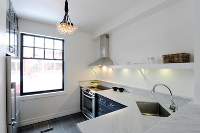 Inspiration for a small transitional l-shaped porcelain tile kitchen pantry remodel in Ottawa with an undermount sink, shaker cabinets, black cabinets, marble countertops, white backsplash, stone slab backsplash and stainless steel appliances