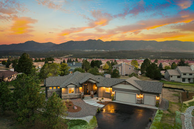 Rustic exterior home idea in Denver