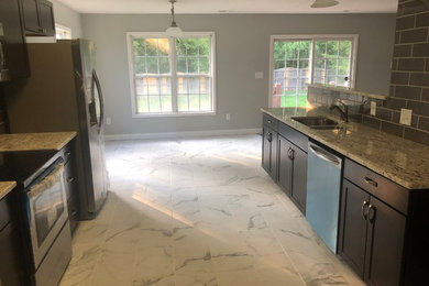 Kitchen - contemporary kitchen idea in Other