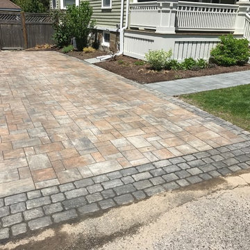 driveway and walkway with granite cobble border