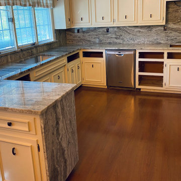 Fantasy Brown - Quartzite. Kitchen countertops with Complete Height Backsplashes