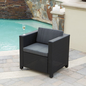 Luxurious Poolscape Featuring Wicker Club Chair