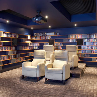 Home theater - contemporary enclosed carpeted home theater idea in Montreal with blue walls and a projector screen