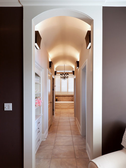 Eclectic Hall Jacksonville Example of an eclectic hallway design in Kansas city with brown walls