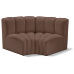 Meridian Furniture - Arc Vegan Leather Upholstered 2-Pc. Inward Curved Modular Sectional, Brown - Unleash modern opulence with the Arc Vegan Leather 2pc. Sectional. Crafted for the modern connoisseur, this Sectional injects an air of refined luxury into any space. Its sleek silhouette, upholstered in supple brown vegan leather, exudes timeless sophistication while the deep channel tufting adds textural intrigue, further elevating the chair's visual appeal. The modular design makes it a versatile chameleon, effortlessly adapting to your evolving needs and preferences. Whether you envision it gracing a chic living room corner, basking in the glow of a bedroom window, or adding a touch of drama to a home office, the Arc seamlessly complements your unique interior aesthetic.