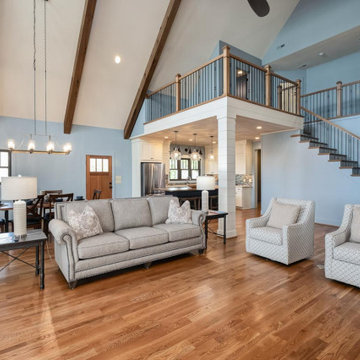 Architectural Designs Exclusive Show-Stopping Vacation Home Plan 18302BE