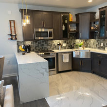 Dark Cabinets white floors white countertops