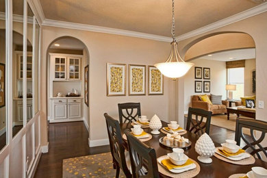 Mid-sized transitional dark wood floor enclosed dining room photo in Salt Lake City with beige walls and no fireplace
