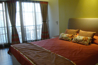 Bedroom - mid-sized contemporary vinyl floor bedroom idea in Kolkata
