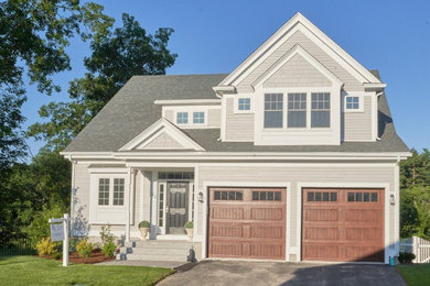 Example of a mid-sized classic two-car garage design in Boston