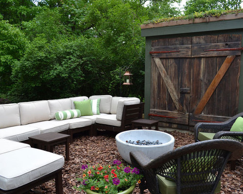 Eclectic Patio Richmond Eclectic patio idea in Philadelphia with a fire feature