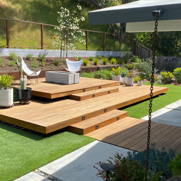 Contemporary Eichler Backyard with Floating Deck