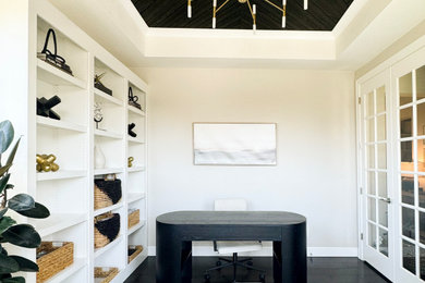 Mid-century modern home office photo in Denver