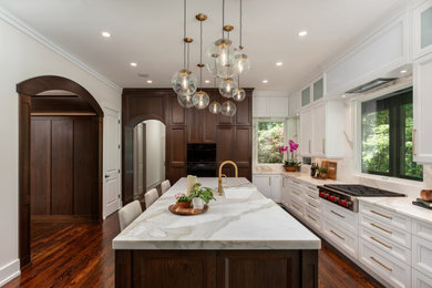 Kitchen - large transitional l-shaped kitchen idea in Other with an island